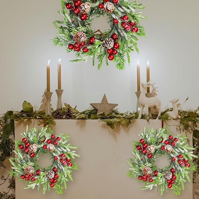 Lyrow 24 Pcs Christmas Candle Rings Wreath Xmas Kitchen Cabinet Mini Wreath Artificial Berries Snowy Pine Candle Ring Holder for Christmas Chandelier Home Table Centerpiece Indoor Decor